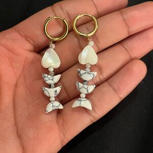 Fish skeleton. With stones and beads, gold-colored stainless steel earrings.